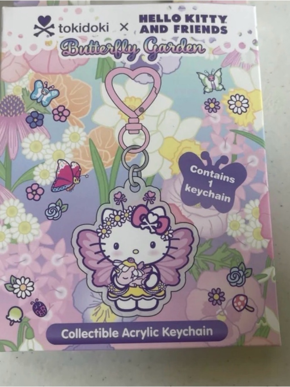 tokidoki Hello Kitty Butterfly Garden Acrylic KuromiKeychain in Pink and Purple